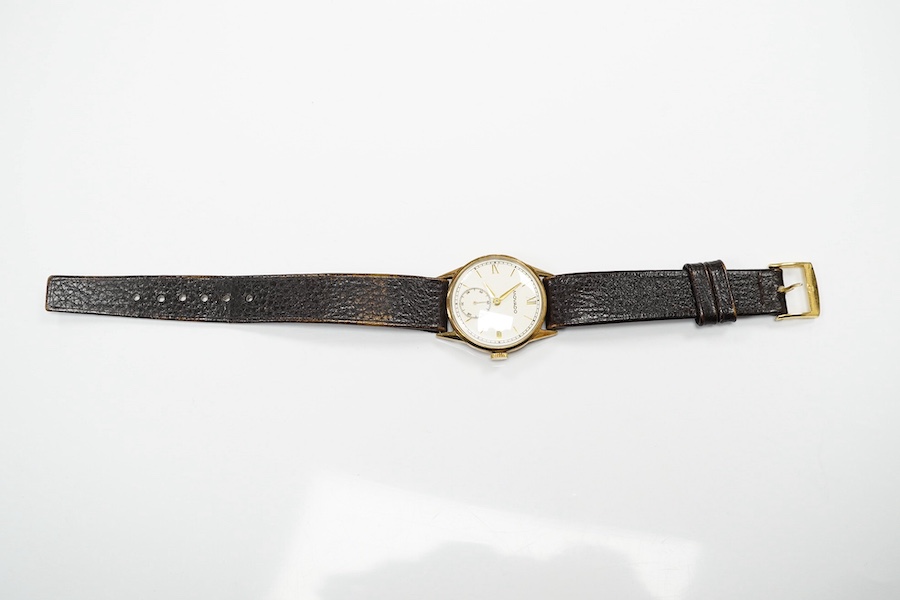 A gentleman's late 1930's 9ct gold Movado manual wind wrist watch, with baton and quarterly numerals and subsidiary seconds, case diameter 29mm, on an associated leather strap. Condition - fair